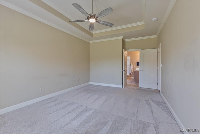 603 Coleman Way, Prattville, AL 36067 - spare room featuring a tray ceiling, baseboards, ceiling fan, light carpet, and ornamental molding