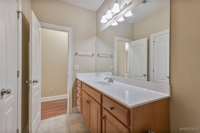 603 Coleman Way, Prattville, AL 36067 - bathroom with tile patterned floors, baseboards, and vanity