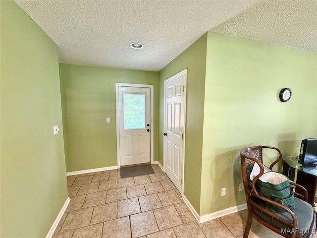 109 Lashley Dr, Selma, AL 36701 - doorway with a textured ceiling and baseboards