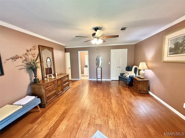 109 Lashley Dr, Selma, AL 36701 - foyer entrance with ornamental molding, visible vents, a ceiling fan, baseboards, and light wood-style floors