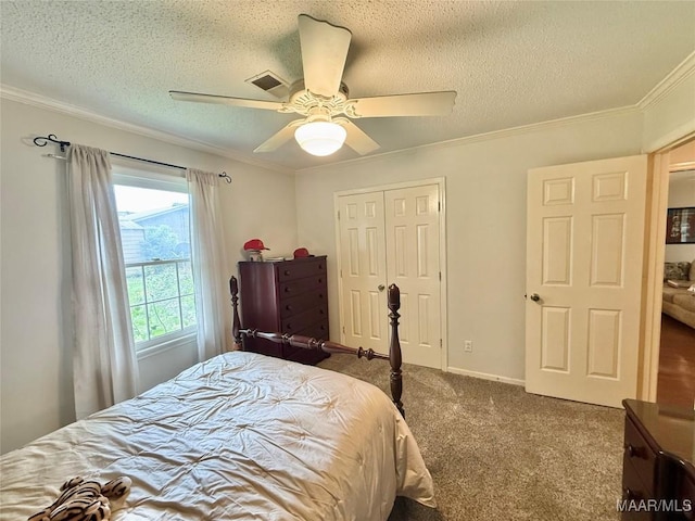 109 Lashley Dr, Selma, AL 36701 - carpeted bedroom featuring ornamental molding, a closet, and a textured ceiling