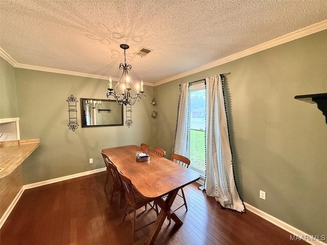 109 Lashley Dr, Selma, AL 36701 - dining area featuring an inviting chandelier, crown molding, a textured ceiling, dark wood-style flooring, and baseboards