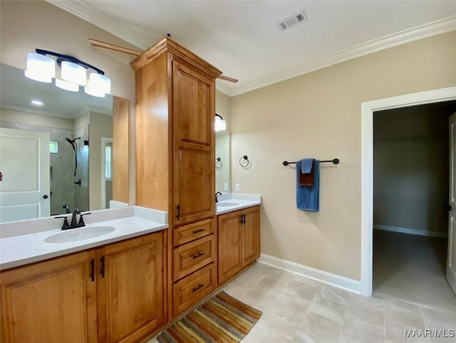full bathroom with double vanity, a sink, visible vents, a shower stall, and ornamental molding