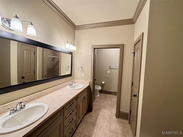 155 Edge Wood Ct, Mathews, AL 36052 - bathroom with crown molding, toilet, tile patterned flooring, double vanity, and a closet