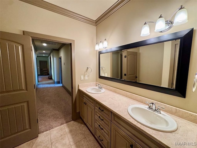 155 Edge Wood Ct, Mathews, AL 36052 - full bath featuring crown molding, double vanity, tile patterned floors, and baseboards
