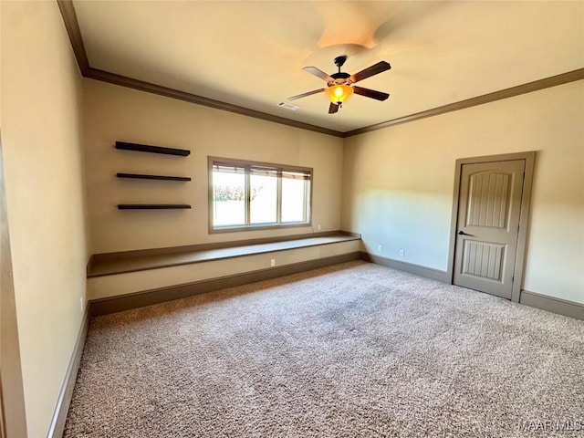 155 Edge Wood Ct, Mathews, AL 36052 - empty room with carpet, ornamental molding, a ceiling fan, and baseboards