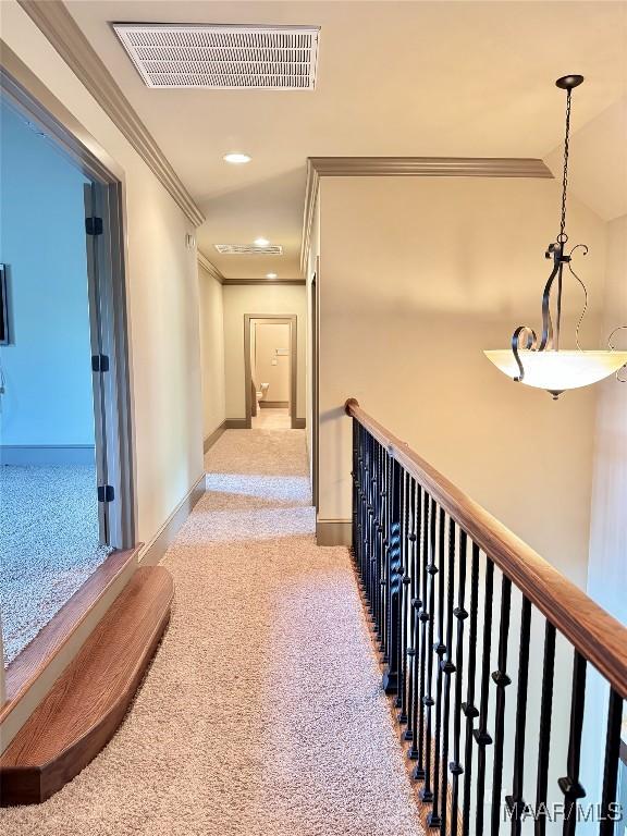 155 Edge Wood Ct, Mathews, AL 36052 - hallway featuring crown molding, carpet floors, baseboards, an upstairs landing, and recessed lighting