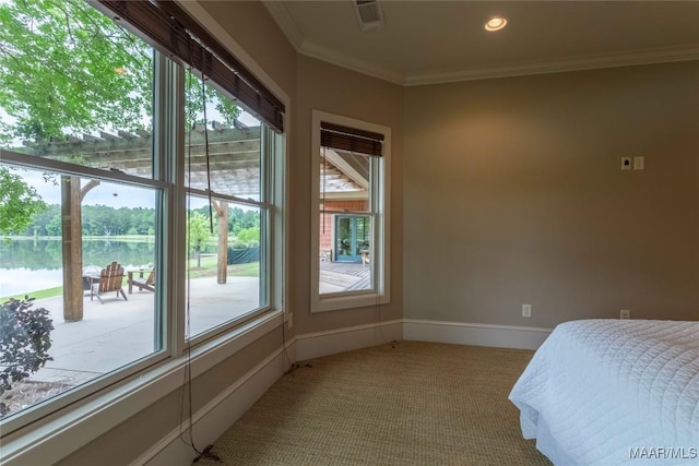 155 Edge Wood Ct, Mathews, AL 36052 - bedroom featuring light carpet, ornamental molding, a water view, multiple windows, and baseboards