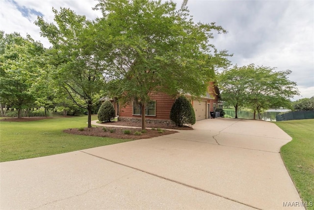 155 Edge Wood Ct, Mathews, AL 36052 - obstructed view of property with concrete driveway and a garage