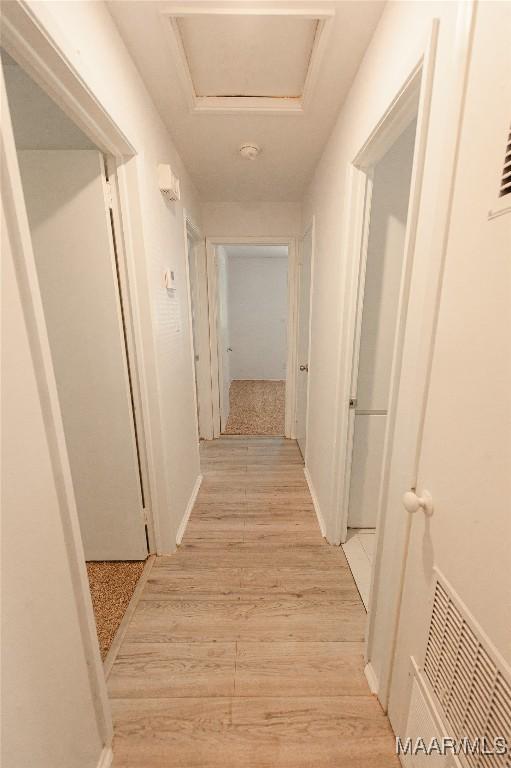 1701 Sylvan Dr, Montgomery, AL 36106 - hall featuring light wood-style flooring and attic access
