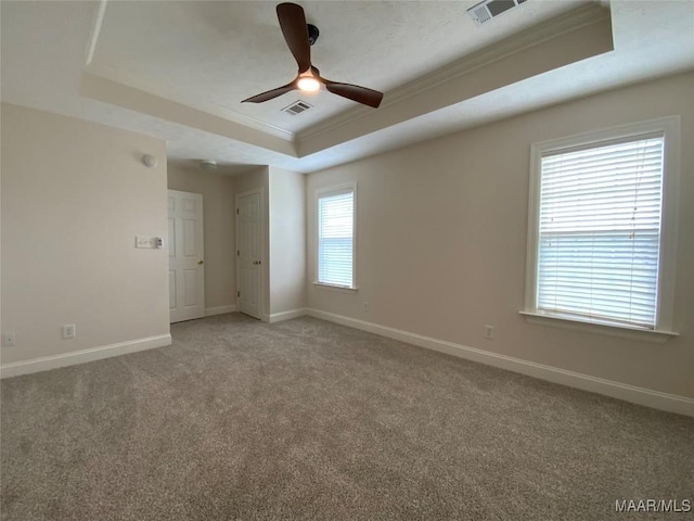 1939 Cedar Ridge Loop, Prattville, AL 36067 - unfurnished room featuring a tray ceiling, light colored carpet, ornamental molding, baseboards, and a ceiling fan