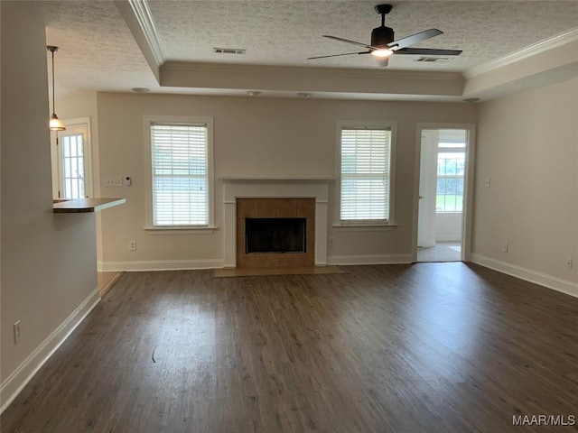 1939 Cedar Ridge Loop, Prattville, AL 36067 - unfurnished living room with crown molding, ceiling fan, healthy amount of natural light, baseboards, and dark wood-style floors