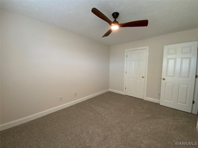 1939 Cedar Ridge Loop, Prattville, AL 36067 - unfurnished bedroom with dark colored carpet, baseboards, and ceiling fan