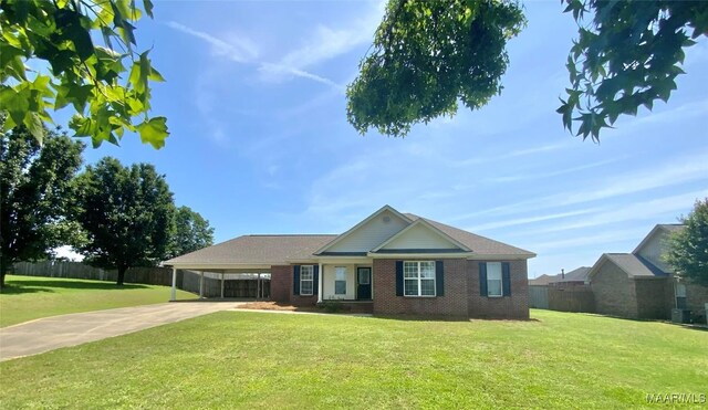 1939 Cedar Ridge Loop, Prattville, AL 36067 - single story home with brick siding, driveway, cooling unit, and a carport