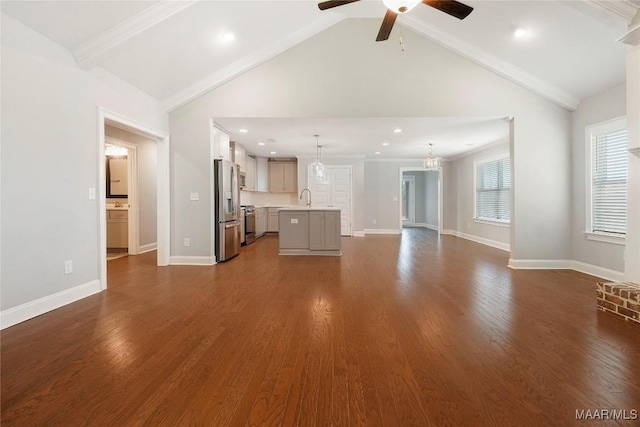 109 Herman Dr, Prattville, AL 36066 - unfurnished living room with a ceiling fan, a sink, beamed ceiling, dark wood-type flooring, and recessed lighting