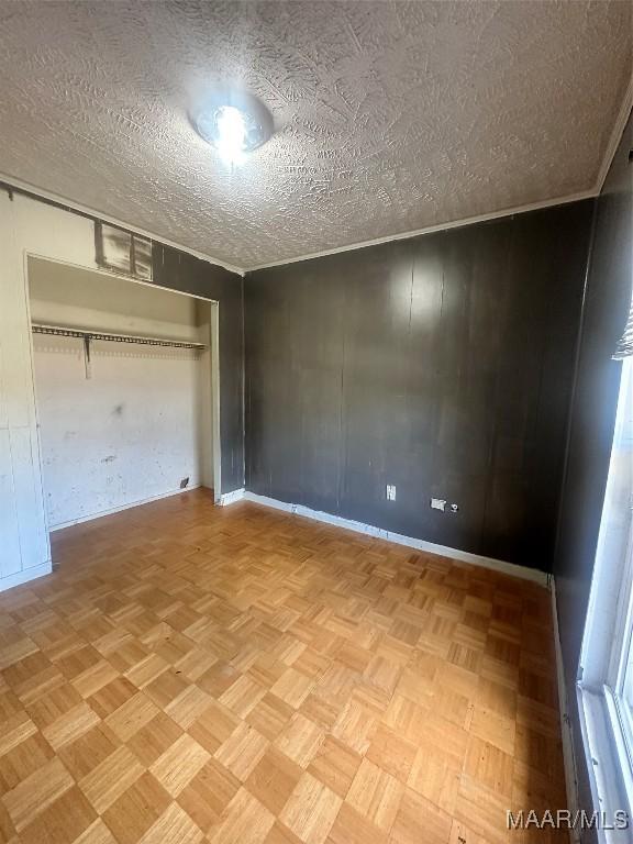 5545 E Shades Valley Dr, Montgomery, AL 36108 - unfurnished bedroom featuring a closet and baseboards