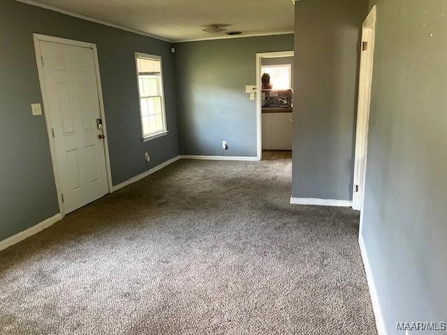 185 Conley Cir, Montgomery, AL 36110 - carpeted empty room featuring baseboards and crown molding