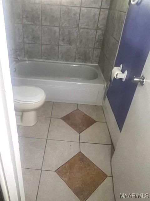 185 Conley Cir, Montgomery, AL 36110 - bathroom with toilet, tile patterned flooring, and  shower combination