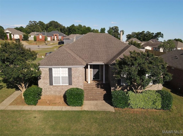1946 Regent Rd, Prattville, AL 36066 - ranch-style house with a front lawn, a shingled roof, and a residential view