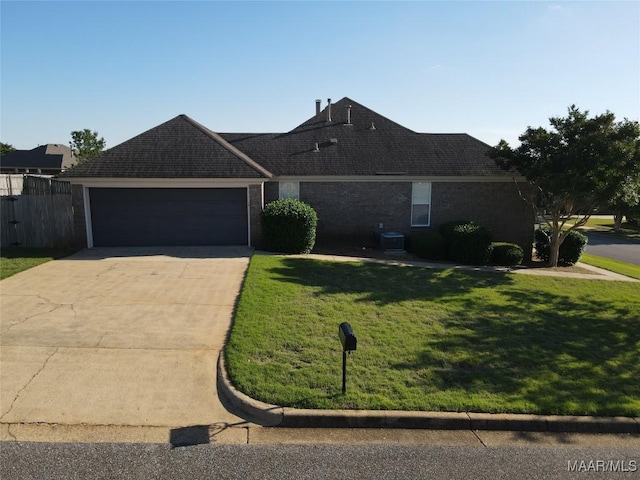 1946 Regent Rd, Prattville, AL 36066 - ranch-style home with a front lawn, a shingled roof, an attached garage, and concrete driveway