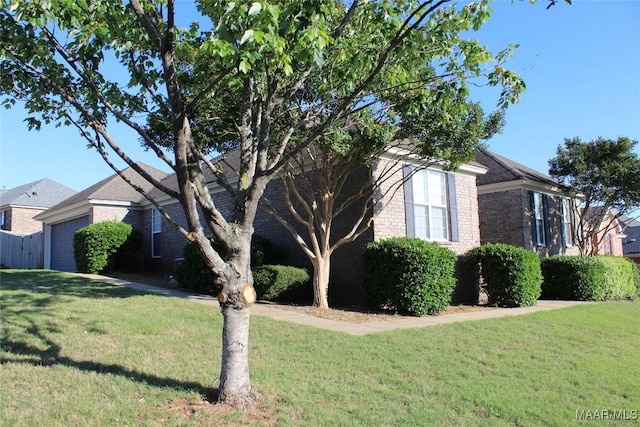 1946 Regent Rd, Prattville, AL 36066 - view of side of property featuring a yard, brick siding, and an attached garage
