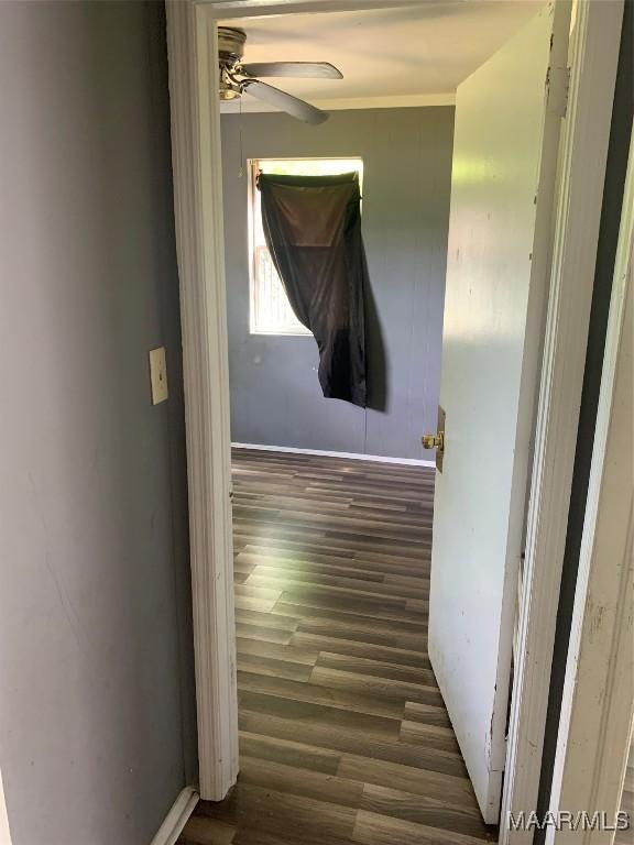 hallway with wood finished floors