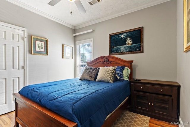 831 Bluegrass Dr, Prattville, AL 36066 - bedroom featuring wood finished floors, crown molding, and ceiling fan