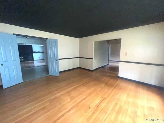 654 Old Jasmine Hill Rd, Wetumpka, AL 36093 - unfurnished room featuring wood finished floors and baseboards