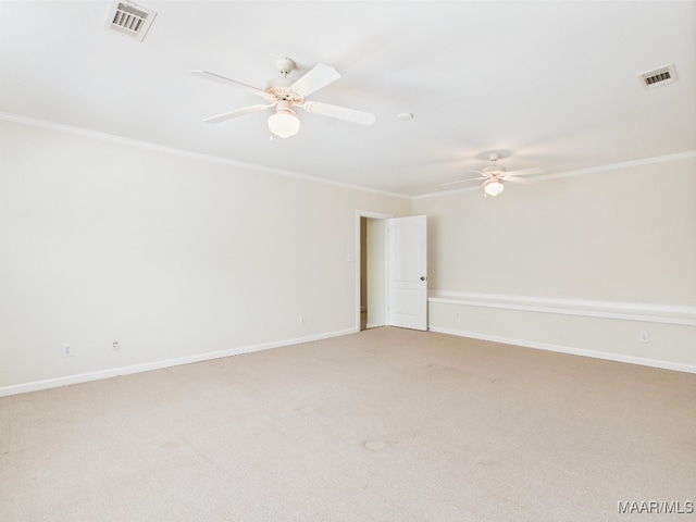 175 Rosemere Dr, Tallassee, AL 36078 - empty room with crown molding, ceiling fan, light carpet, and baseboards