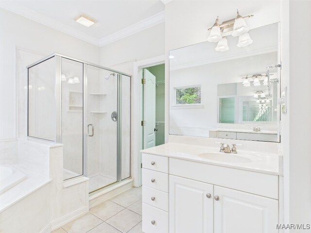175 Rosemere Dr, Tallassee, AL 36078 - full bathroom featuring tile patterned floors, ornamental molding, a stall shower, a bath, and vanity