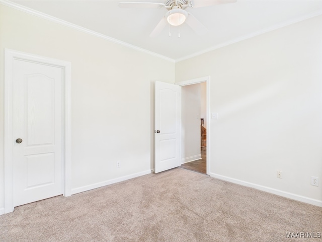175 Rosemere Dr, Tallassee, AL 36078 - unfurnished room featuring carpet floors, ceiling fan, crown molding, and baseboards
