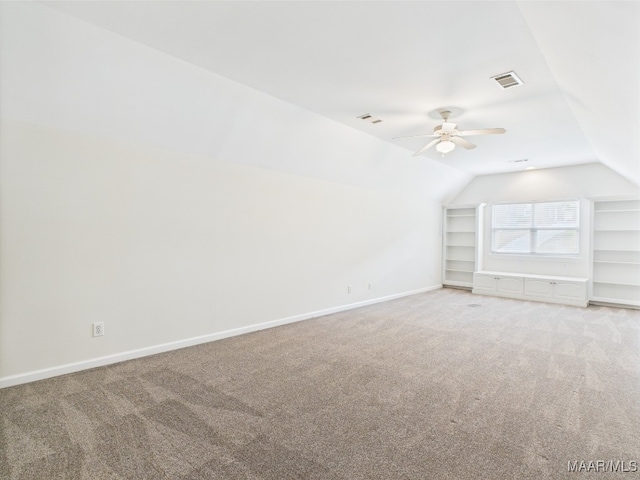 175 Rosemere Dr, Tallassee, AL 36078 - additional living space featuring carpet floors, vaulted ceiling, baseboards, and a ceiling fan