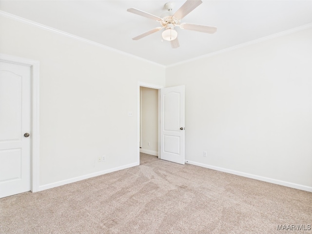 175 Rosemere Dr, Tallassee, AL 36078 - carpeted empty room featuring crown molding, a ceiling fan, and baseboards