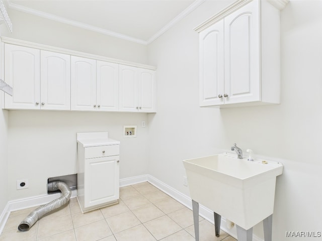 175 Rosemere Dr, Tallassee, AL 36078 - clothes washing area featuring hookup for an electric dryer, washer hookup, baseboards, ornamental molding, and cabinet space