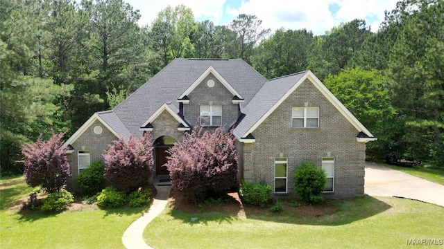 175 Rosemere Dr, Tallassee, AL 36078 - view of front of home featuring a front lawn and brick siding