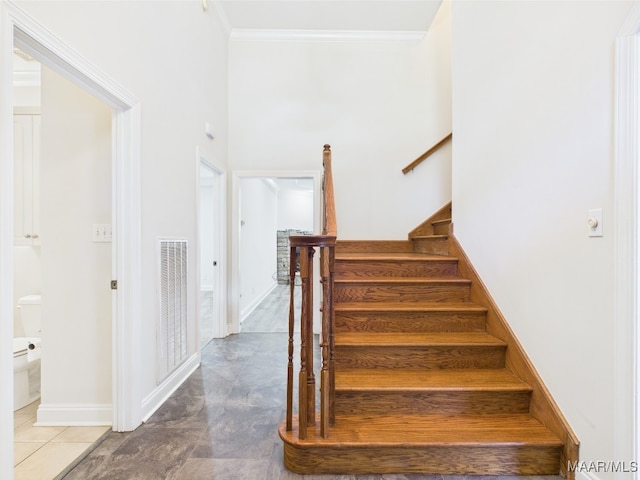175 Rosemere Dr, Tallassee, AL 36078 - stairway with crown molding and baseboards