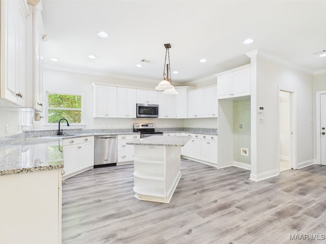 175 Rosemere Dr, Tallassee, AL 36078 - kitchen with appliances with stainless steel finishes, ornamental molding, white cabinets, open shelves, and recessed lighting