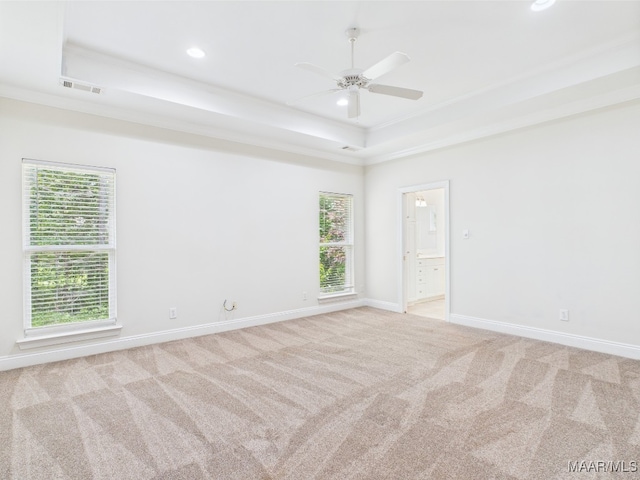 175 Rosemere Dr, Tallassee, AL 36078 - empty room with a raised ceiling, light carpet, a ceiling fan, recessed lighting, and baseboards