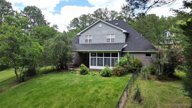 175 Rosemere Dr, Tallassee, AL 36078 - rear view of house featuring a shingled roof, a sunroom, and brick siding