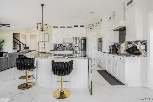 211 Oakwood Dr, Hope Hull, AL 36043 - kitchen with stainless steel appliances, a sink, backsplash, open floor plan, and light marble finish flooring