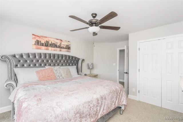 211 Oakwood Dr, Hope Hull, AL 36043 - bedroom featuring carpet, a closet, baseboards, and ceiling fan
