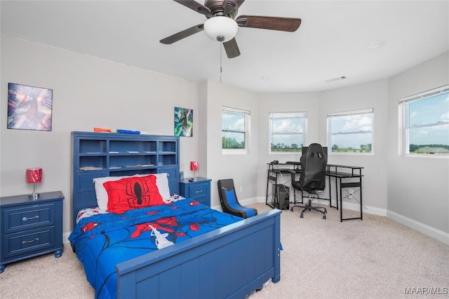 211 Oakwood Dr, Hope Hull, AL 36043 - bedroom featuring light carpet, an office area, baseboards, and a ceiling fan