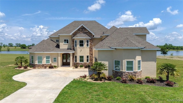 211 Oakwood Dr, Hope Hull, AL 36043 - view of front facade featuring stucco siding, stone siding, concrete driveway, a front lawn, and roof with shingles
