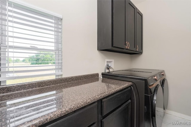 211 Oakwood Dr, Hope Hull, AL 36043 - laundry area with washer and clothes dryer, cabinet space, baseboards, and light marble finish flooring