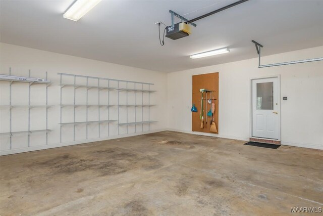 8180 Longneedle Pl, Montgomery, AL 36117 - garage with a garage door opener