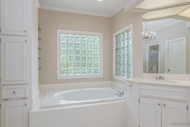 8180 Longneedle Pl, Montgomery, AL 36117 - full bath with a bath, a stall shower, a chandelier, vanity, and crown molding