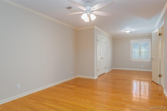 8180 Longneedle Pl, Montgomery, AL 36117 - spare room with light wood finished floors, crown molding, baseboards, and a ceiling fan