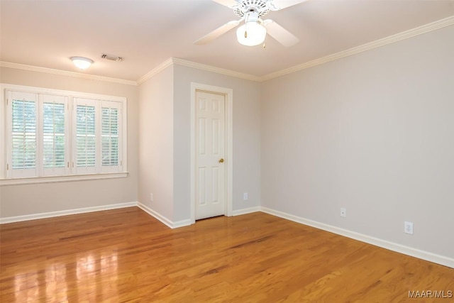 8180 Longneedle Pl, Montgomery, AL 36117 - unfurnished room featuring light wood finished floors, ceiling fan, crown molding, and baseboards