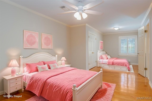 8180 Longneedle Pl, Montgomery, AL 36117 - bedroom with wood finished floors, ornamental molding, baseboards, and ceiling fan