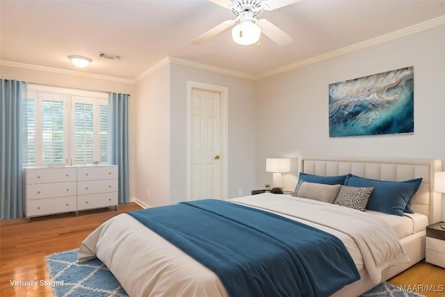 8180 Longneedle Pl, Montgomery, AL 36117 - bedroom featuring crown molding, wood finished floors, and ceiling fan